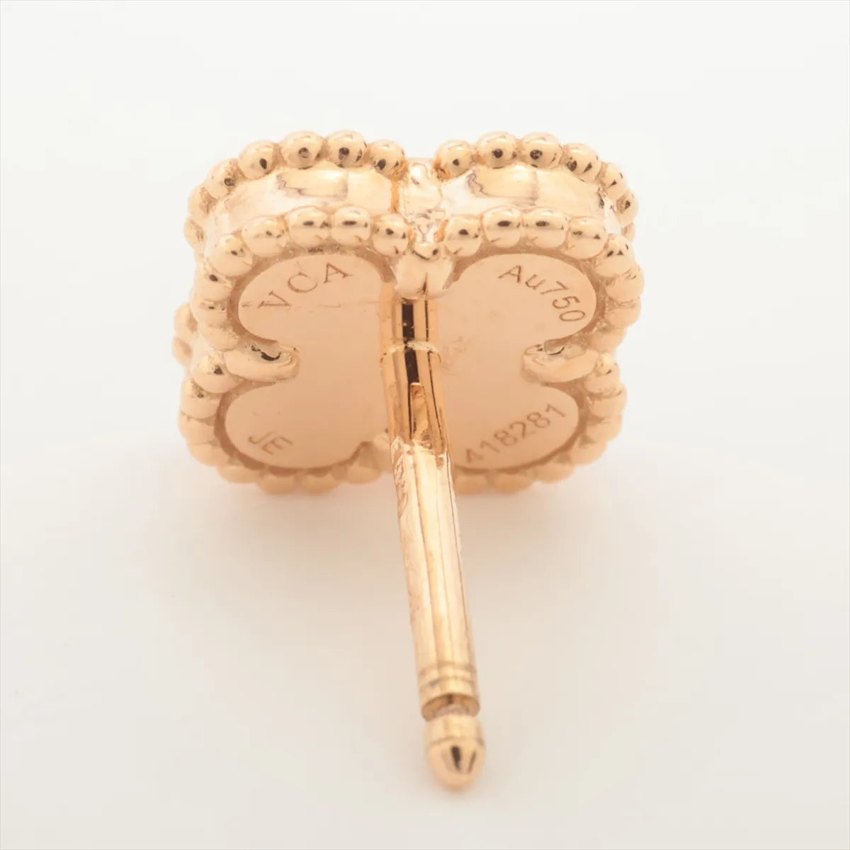 Rose gold butterfly-shaped earring with engraved text 