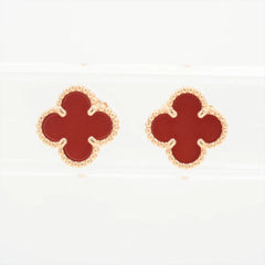 Pair of red clover-shaped earrings with gold outlines 