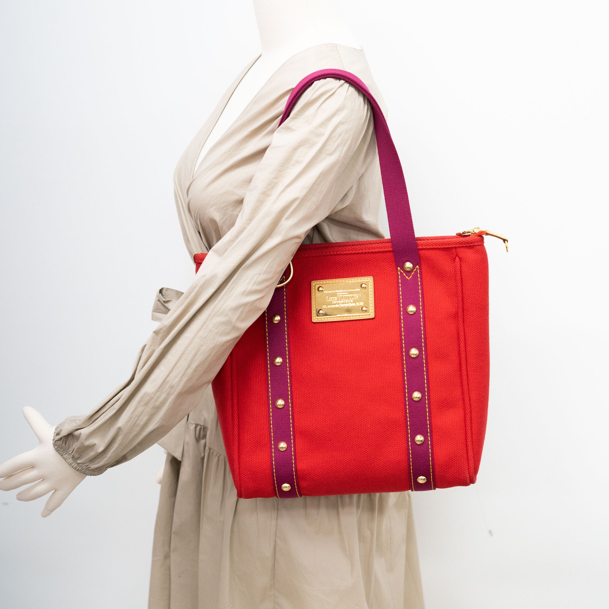 Sold at Auction: Louis Vuitton, LOUIS VUITTON ANTIGUA CABAS BG/RED CANVAS  BAG