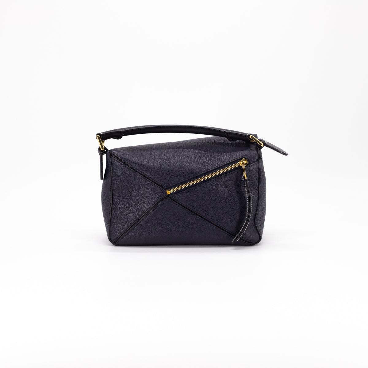 Got my dream Loewe small puzzle bag in midnight navy/black, pre-loved but  in stellar condition! I wanted one in a dark color with gold hardware and  this was one of the only