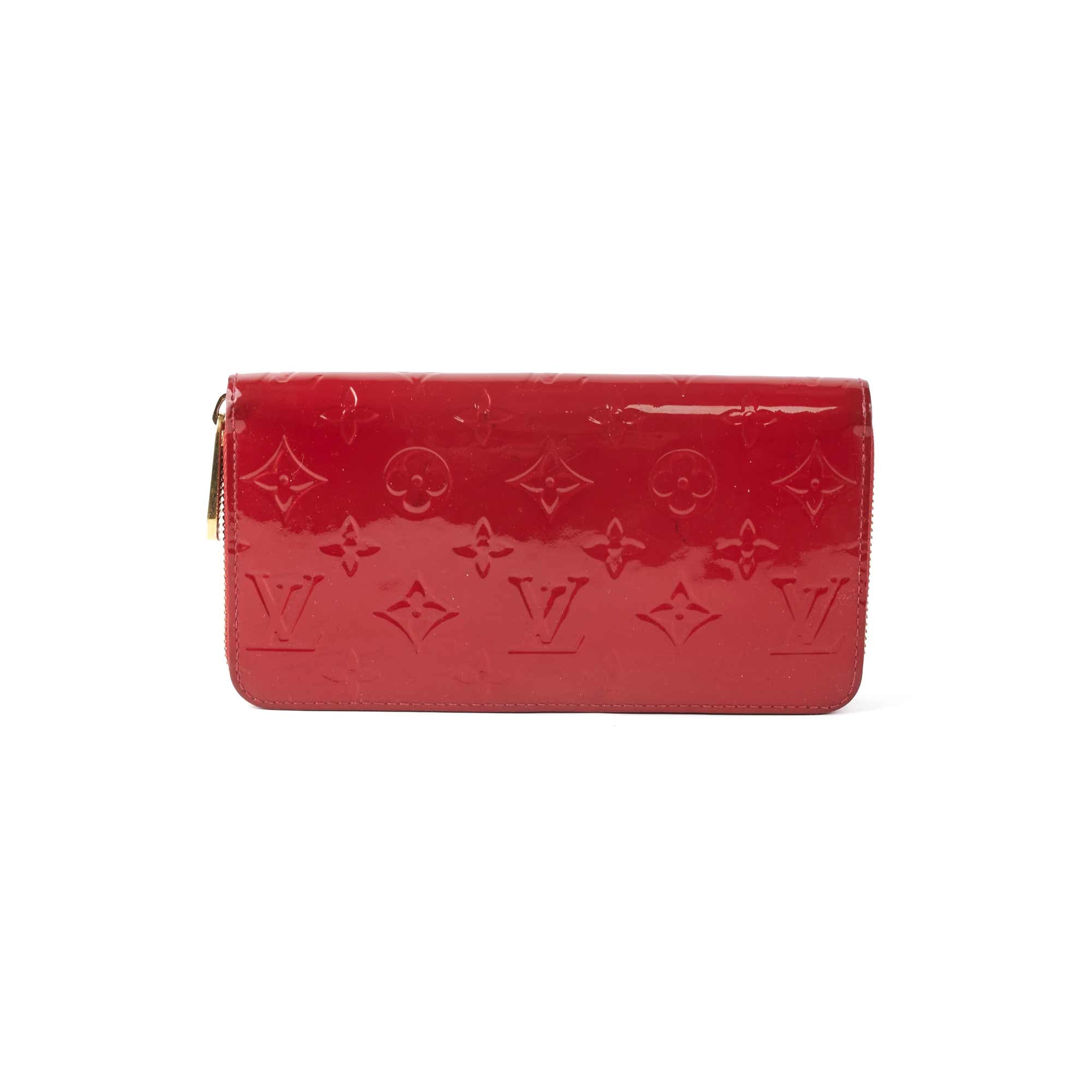 Leather wallet Louis Vuitton Red in Leather - 35592219